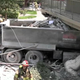 Image for article titled Two Injured, One Killed As Dump Truck Plows Into An Apartment Building